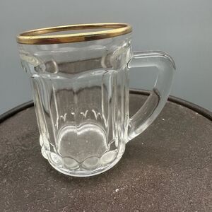 Embossed miniature gold rimmed glass mug